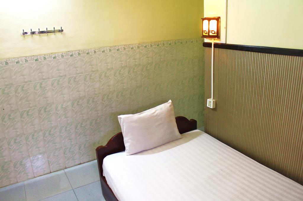 Tt Guesthouse Phnom Penh Quarto foto