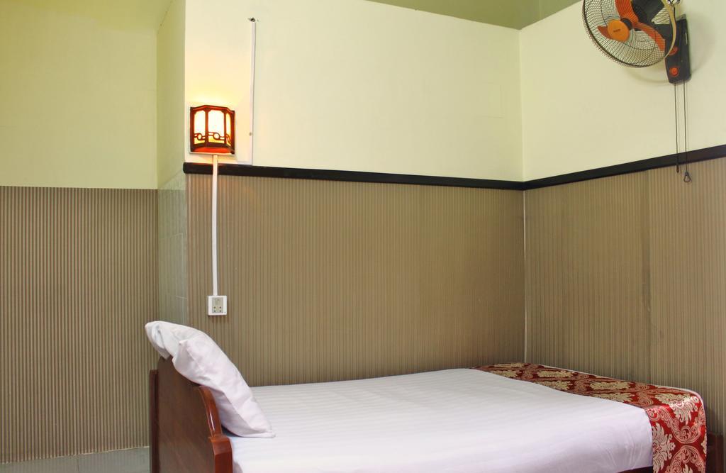 Tt Guesthouse Phnom Penh Quarto foto